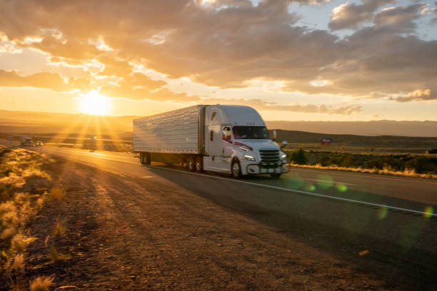JackTrans service truck on the highway at dusk