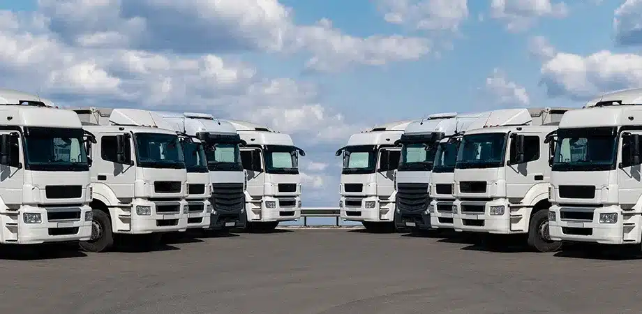 Fleet of serviced trucks staged in a distribution yard
